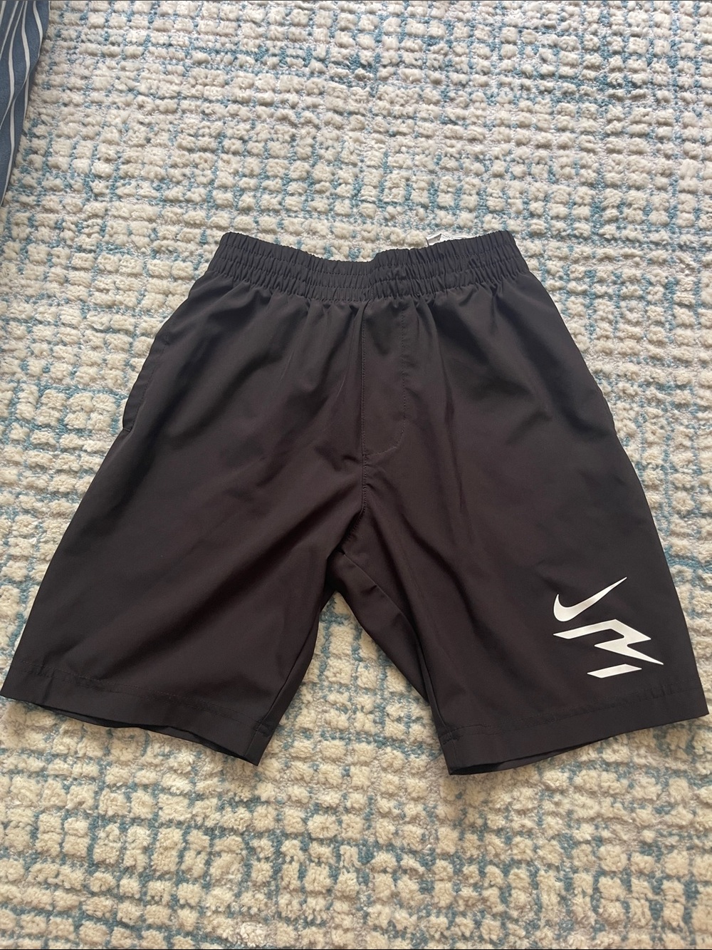 Nike Black Shorts with White Swoosh Accent